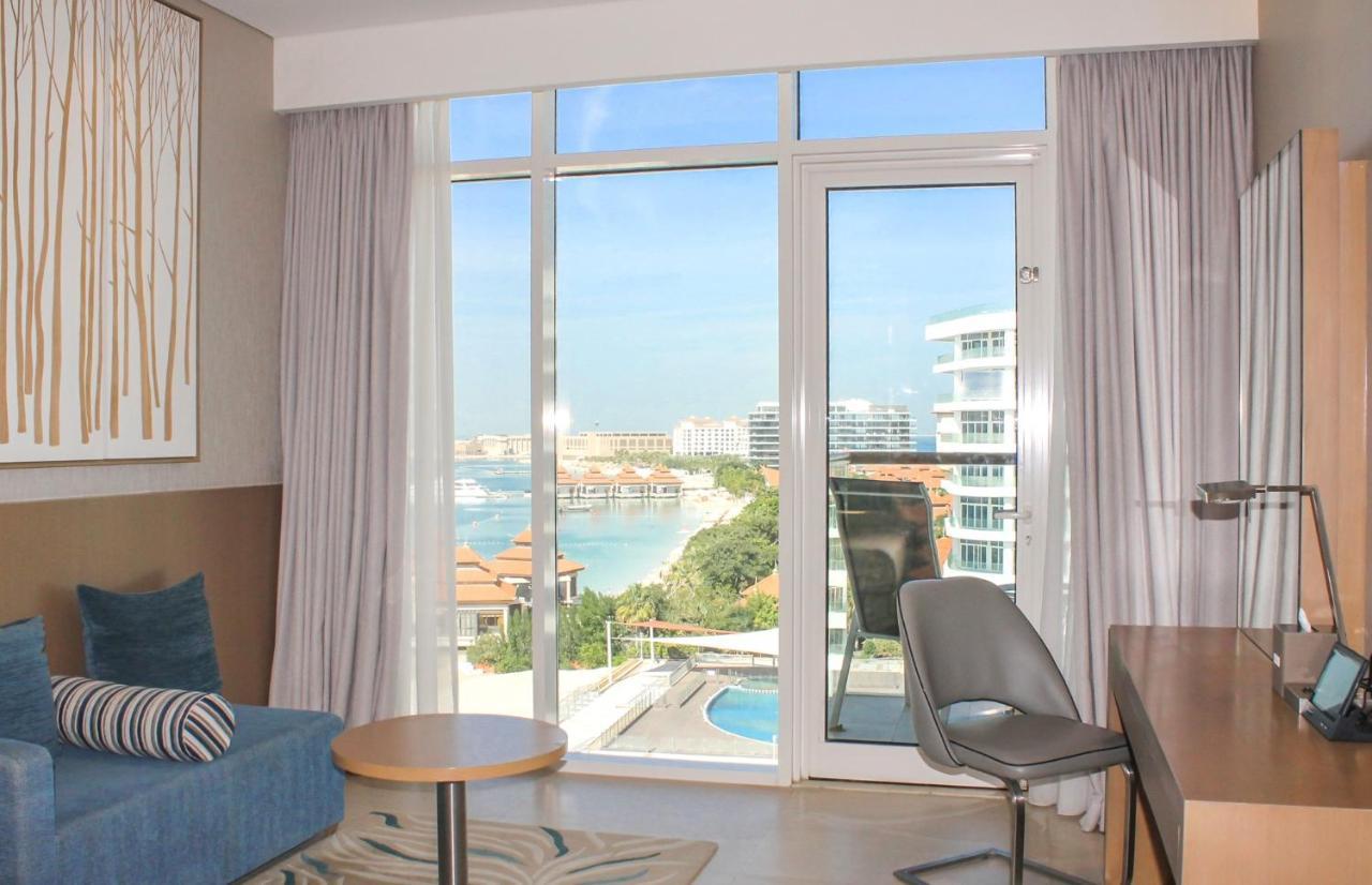 Deluxe Doppelzimmer mit Balkon und Zugang zum hoteleigenen Strand