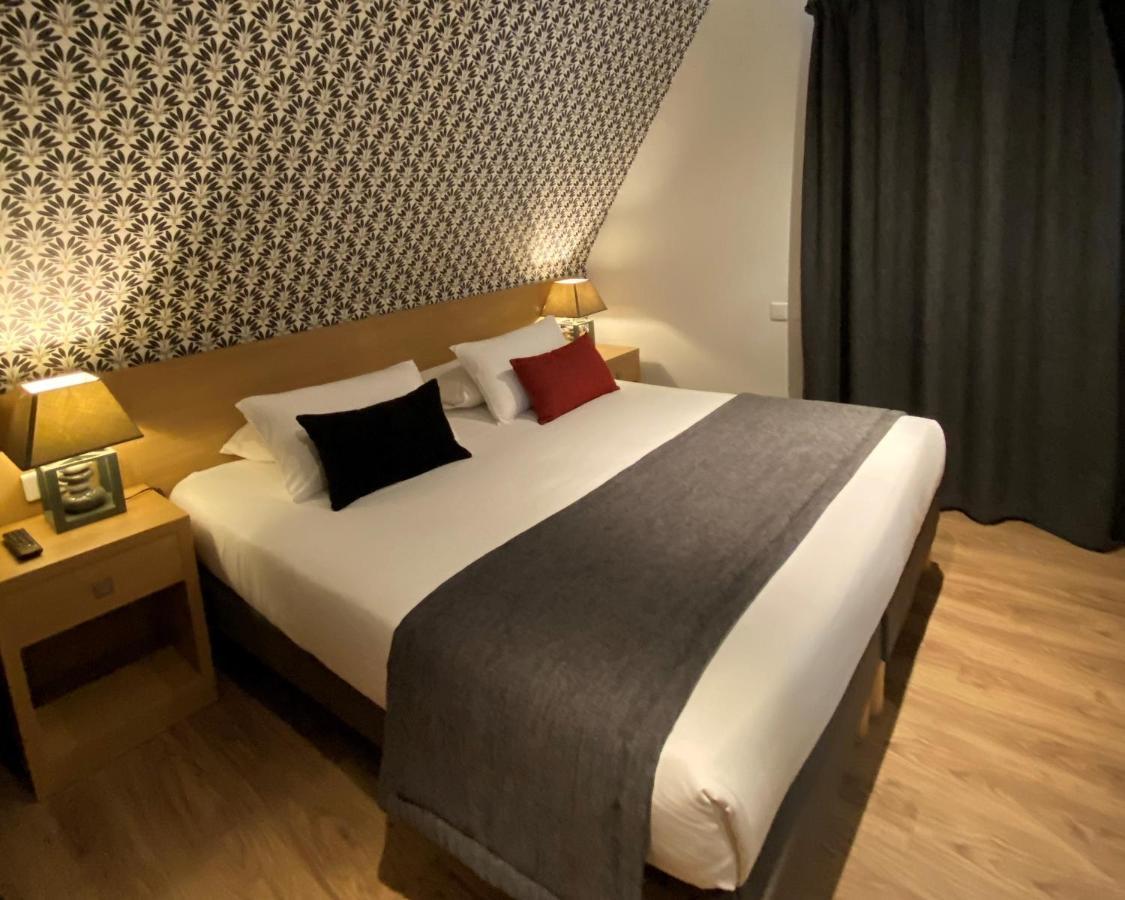 Chambre Triple (1 Lit Double et 1 Lit Simple)