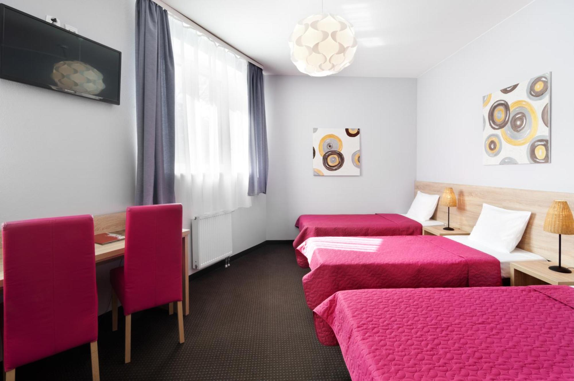 Dreibettzimmer