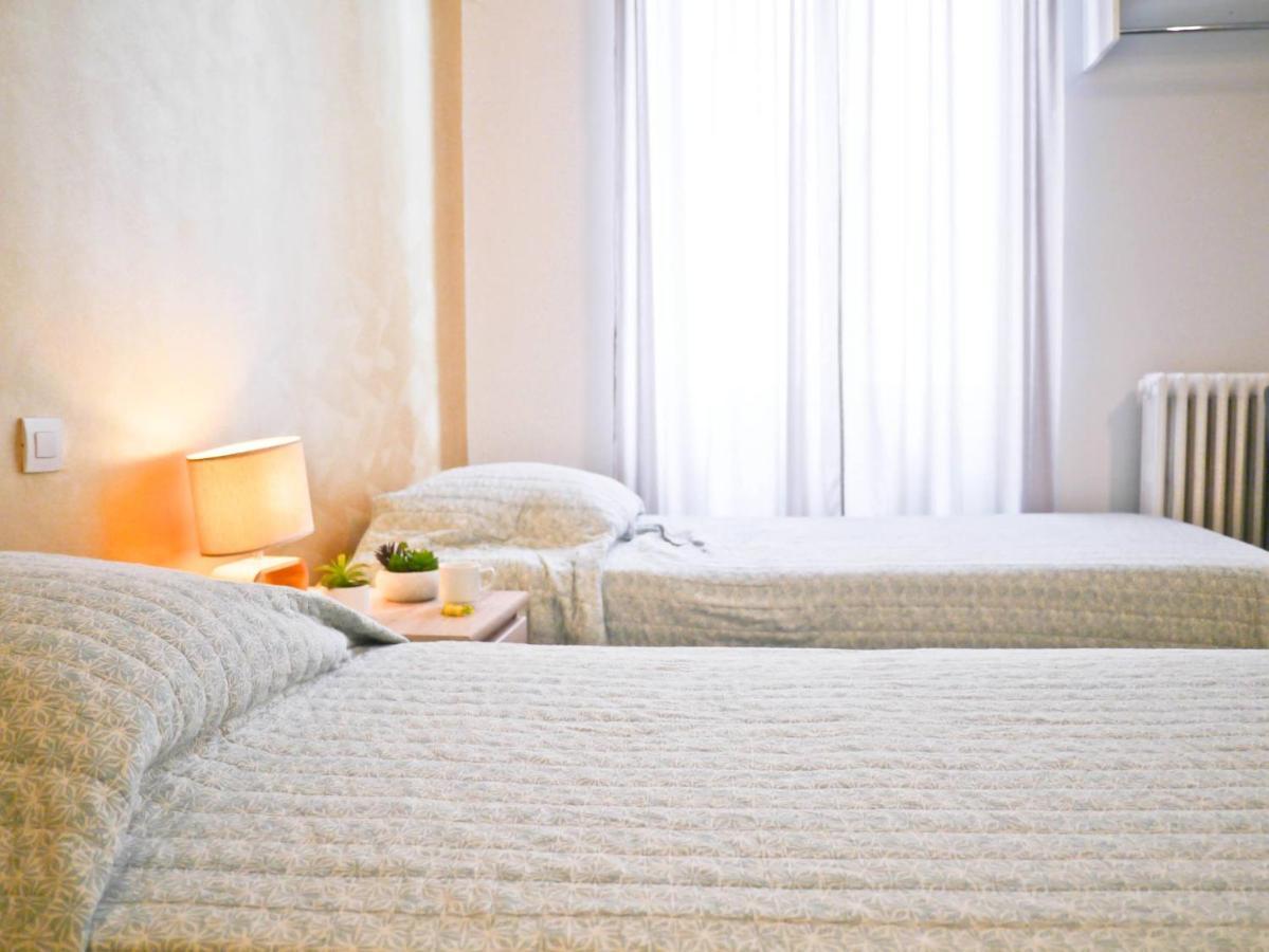 Chambre Quadruple (1 Lit Double et 2 Lits Simples)