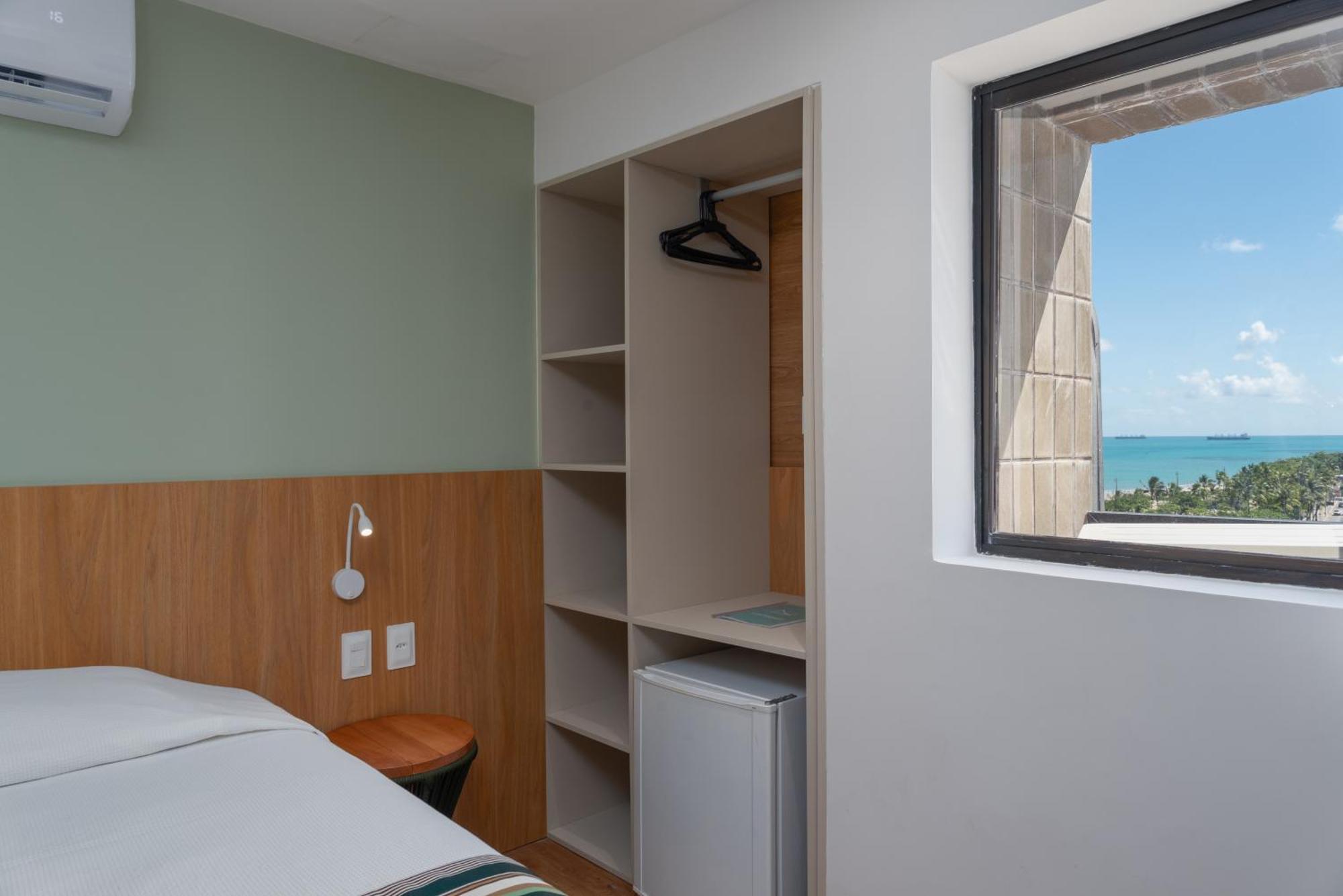 Quarto Triplo Premium