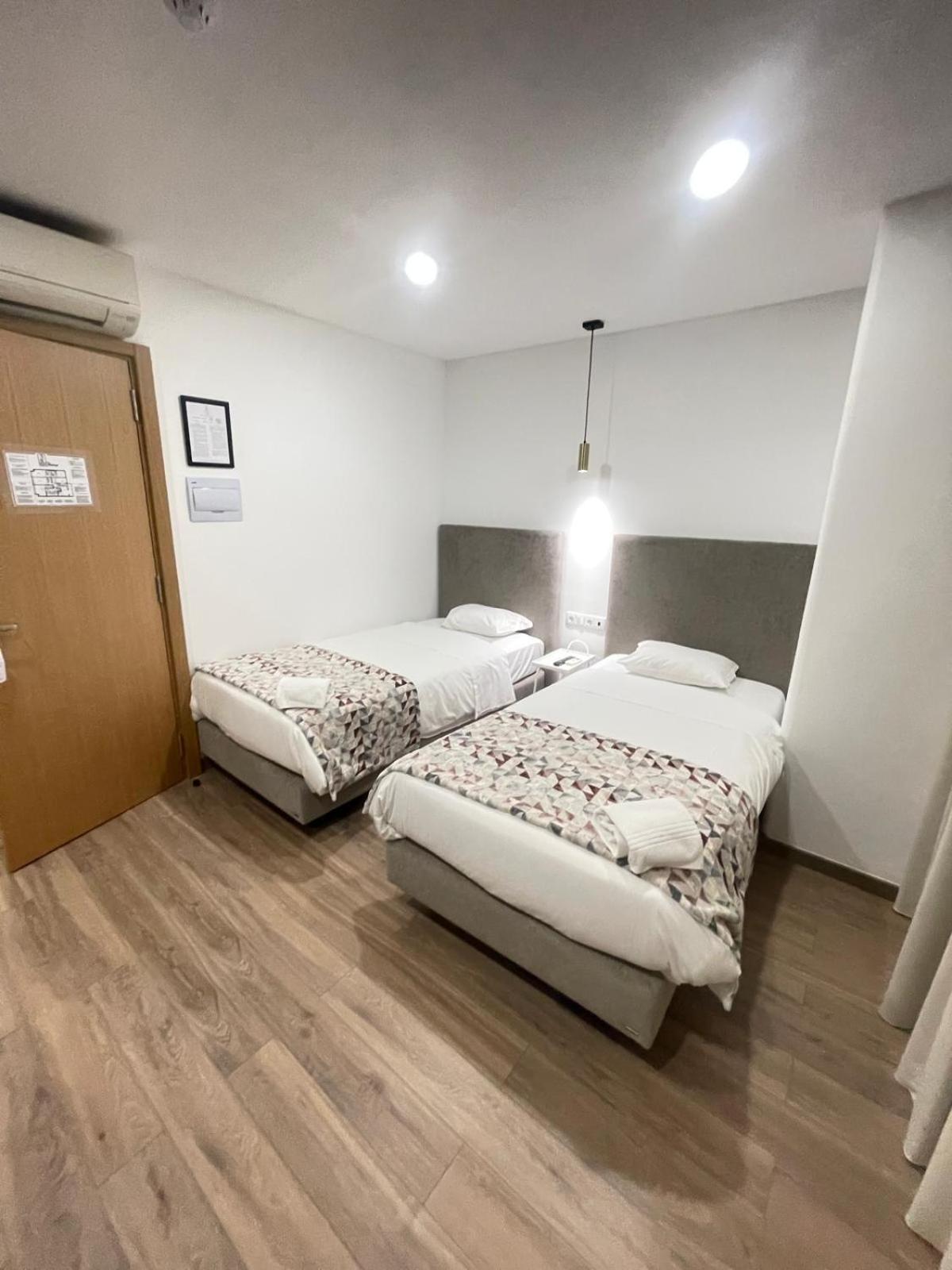 Tweepersoonskamer met 1 of 2 Bedden en een Extra Bed