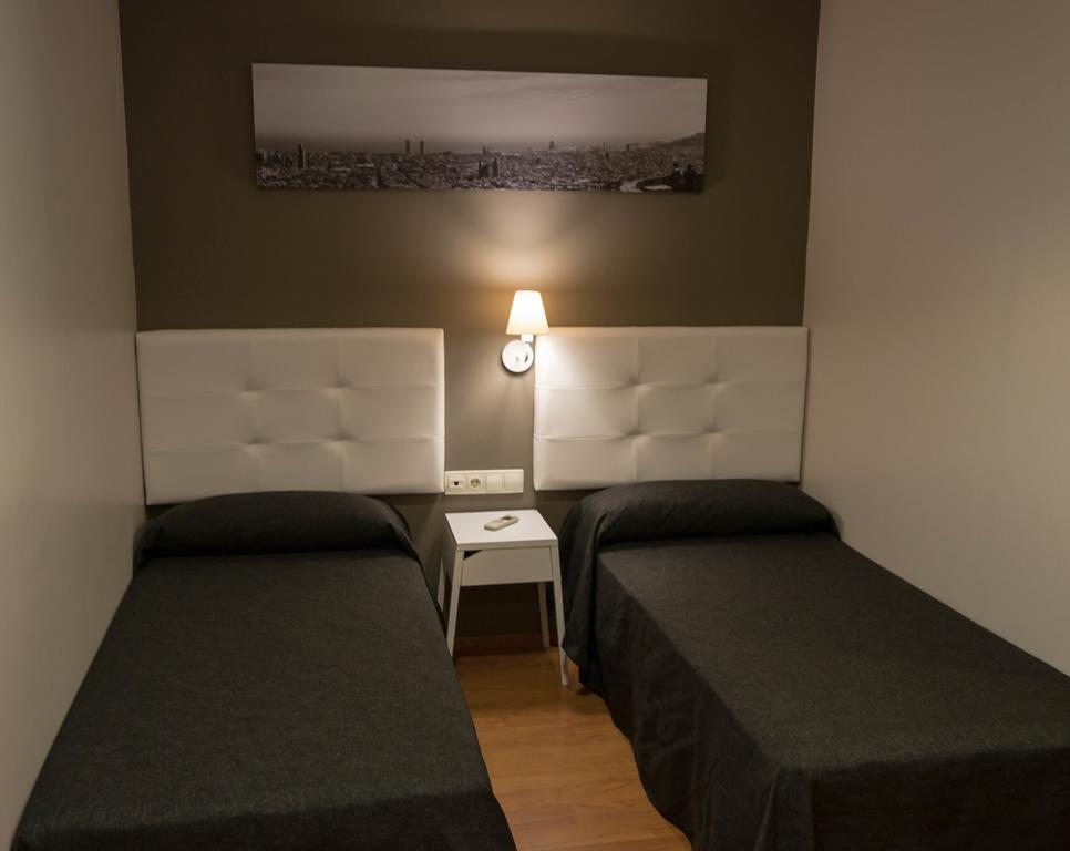 Quarto com 2 Camas de Solteiro