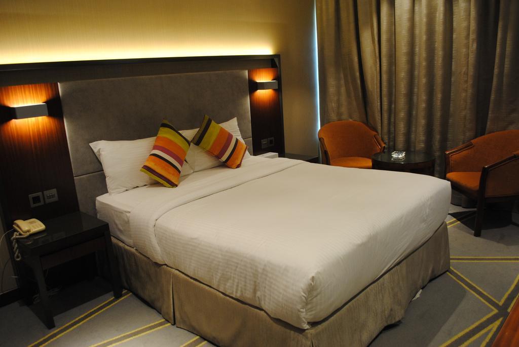 Chambre Double Deluxe (2 Adultes + 1 Enfant)