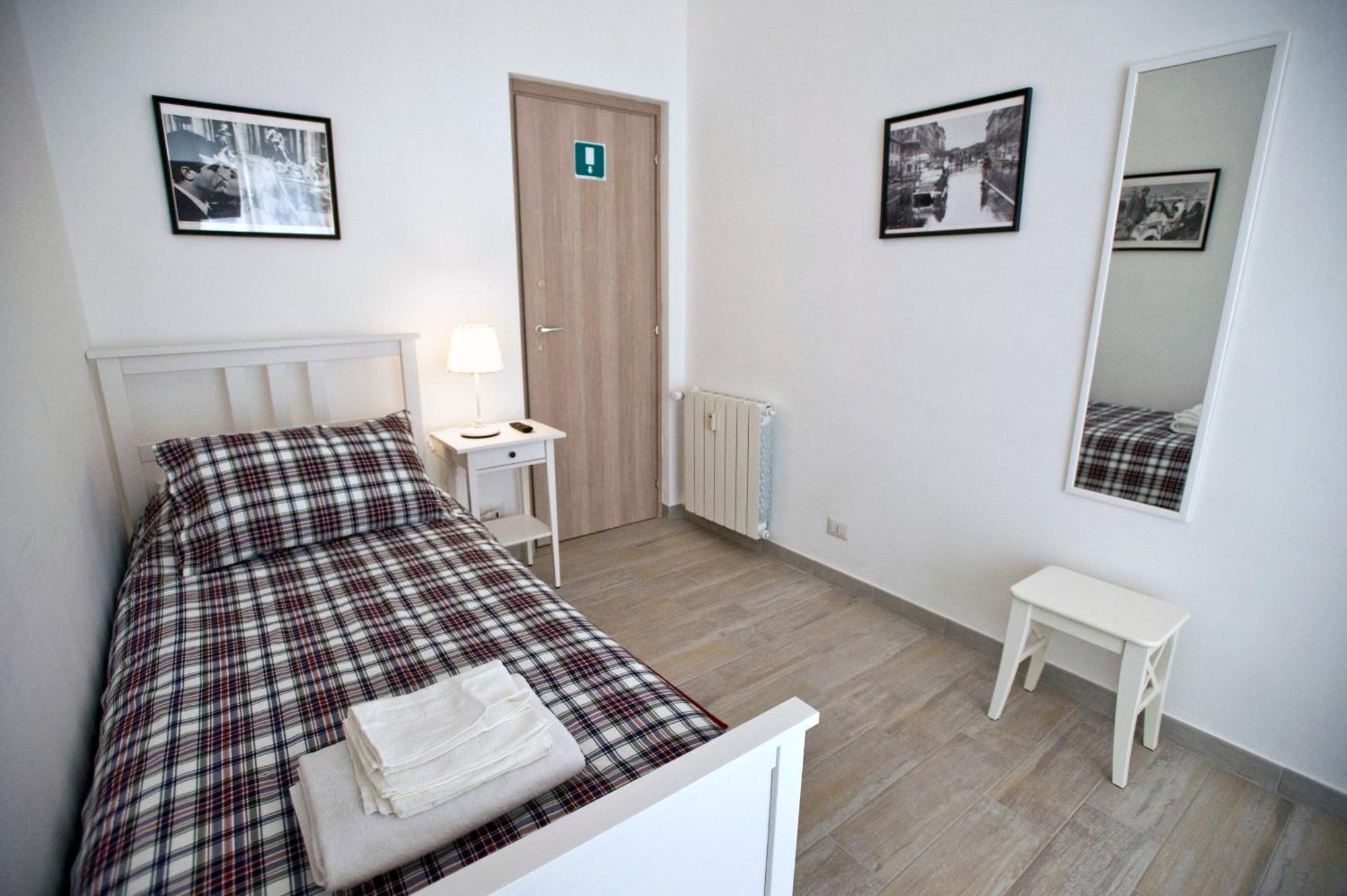 Camera Singola con Bagno in Comune