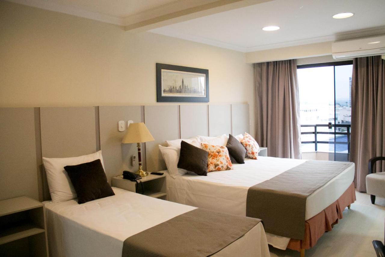Quarto Triplo Premium