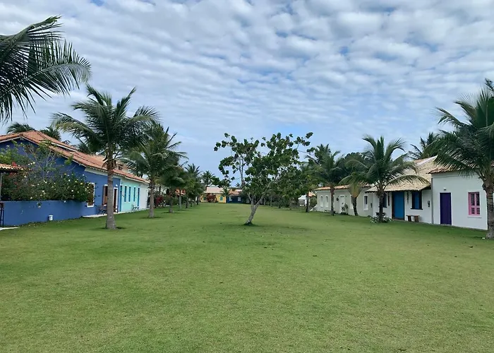 Charmoso bangalô balinês pé na areia Outeiro das Brisas
