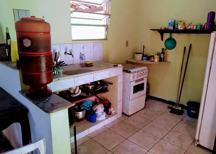 Casa da cachoeira na beira do Rio Sana