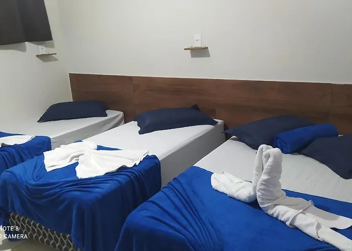 Pousada Quarto com frigobar,ar e garagem gratuita