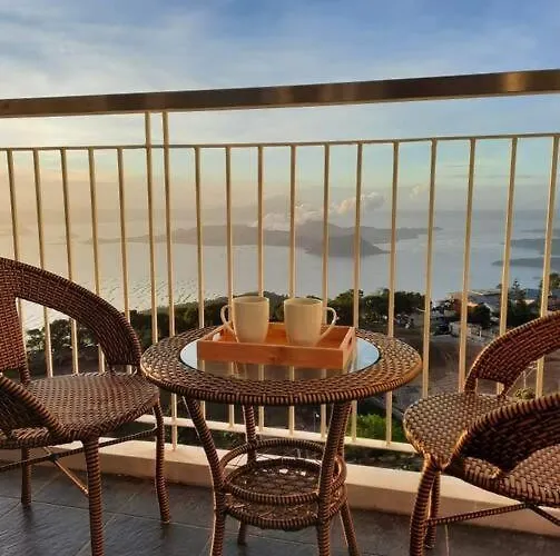 1 Bedroom Cozy Farmhouse-Style Condo With Balcony & Taal View At Wind Residences