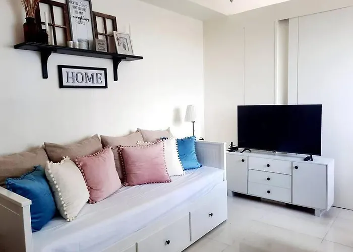 1 Bedroom Cozy Farmhouse-Style Condo With Balcony & Taal View At Wind Residences