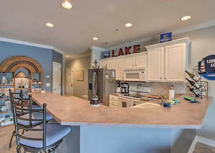 Balcony & Seasonal Pool: Lakefront Ozark Condo
