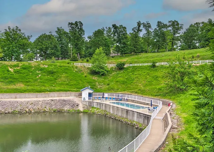 Boat Slip & Pool! Waterfront Lake Ozark Escape