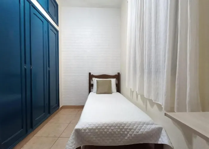 Quarto Individual em Hospedaria no Centro