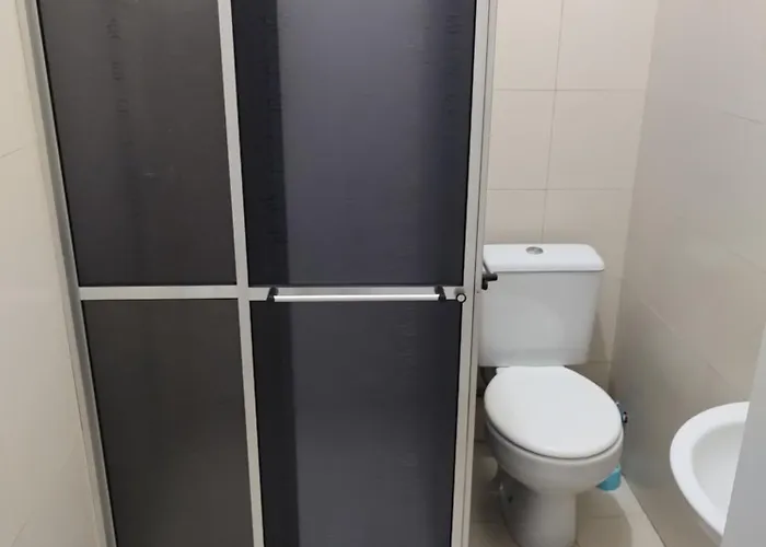Quarto confortável em Est Velha