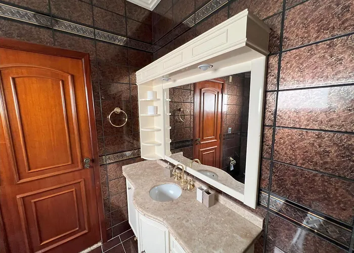 Suíte de luxo no centro com closet e hidromassagem