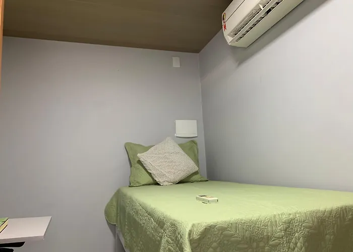 STUDIO aconchego, com Ar, Wifi, Smartv e Cozinha