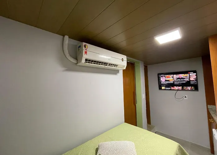 STUDIO aconchego, com Ar, Wifi, Smartv e Cozinha