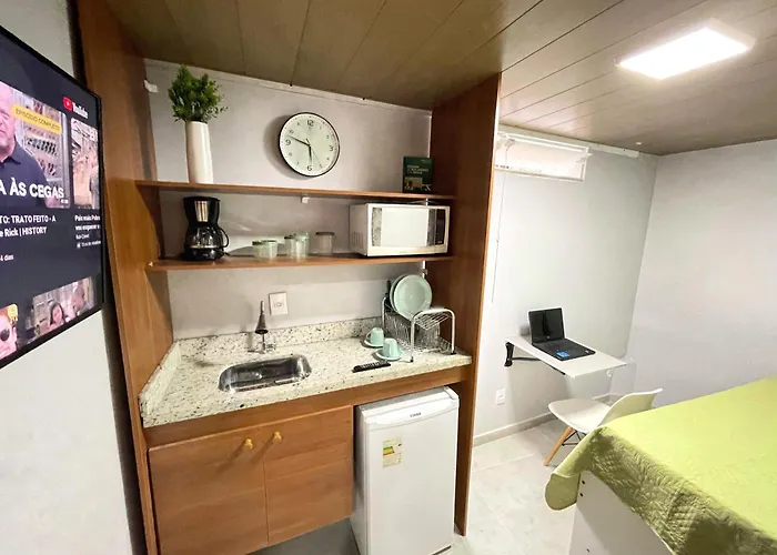 STUDIO aconchego, com Ar, Wifi, Smartv e Cozinha