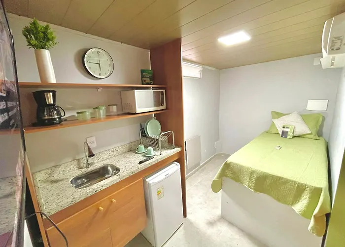 STUDIO aconchego, com Ar, Wifi, Smartv e Cozinha