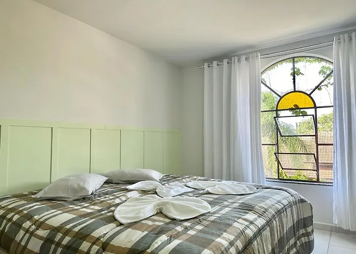 Suíte na casa amarela