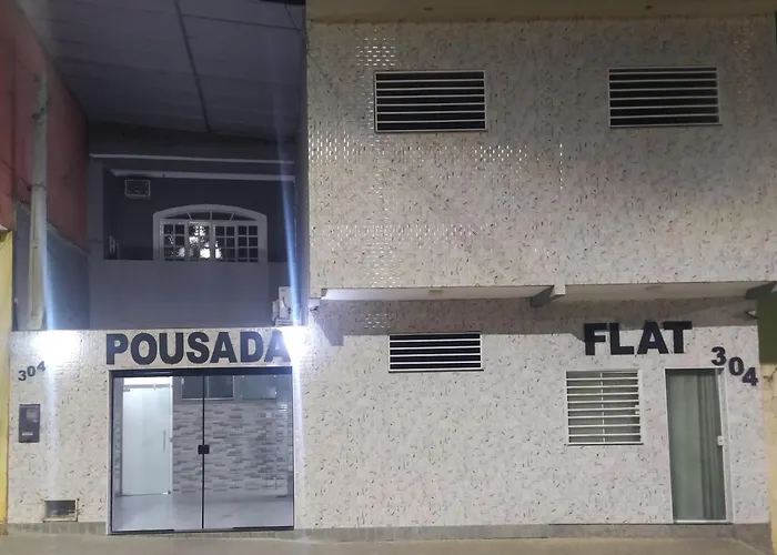 Pousada Quarto com tv,ar,frigobar,wifi e garagem