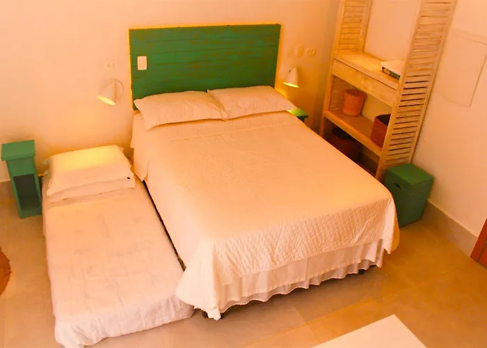 Casa d'Aroeira Residencial Boutique - Centro de Juqueí - 2 quadras do mar - Serviço de Praia - Roupa de Cama 600 fios algodão Egípcio - Toalhas Banho e Praia - Tudo Novo - Estacionamento Interno - Cozinha - Consulte unidades com Ofurô Hidro e Cromote