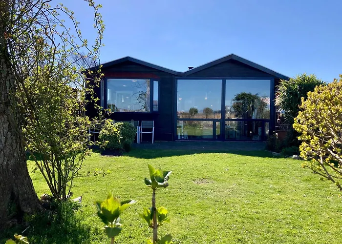 6 pers House Marijke with winter garden&direct access to the Lauwersmeer