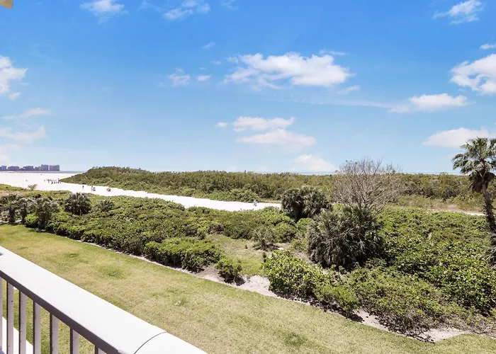 Beachfront Condo With Pool And Wraparound Balcony