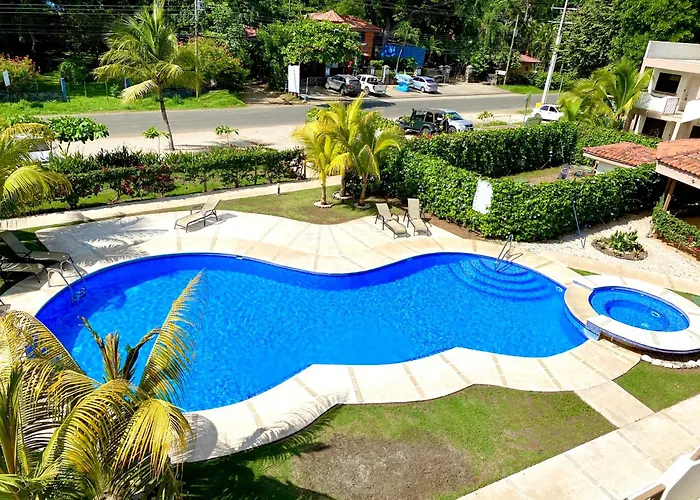 Two Palms Ground Floor Unit Across From Beach