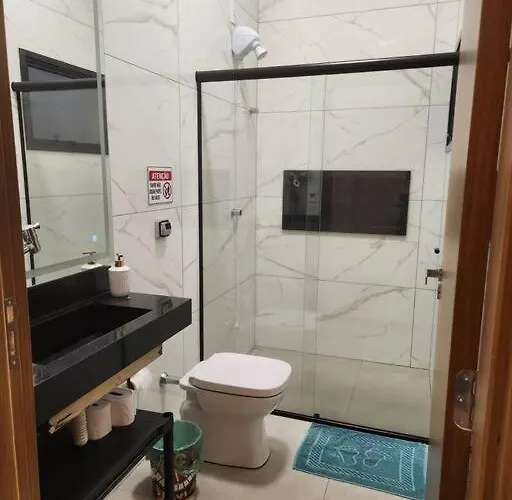 Suíte Aconchegante e Garagem Grátis - Até 4 Pessoas