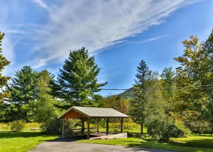 Stream-Side Atrium Home With Side Rooms & Pool Table