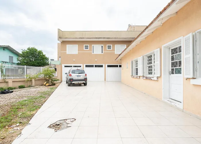 Suítes Privativas no Centro a 60m da Praia Ar Condicionado Banheiro Privativo Cozinha Completa e Lavanderia compartilhada Conforto Garantido Reserve agora mesmo