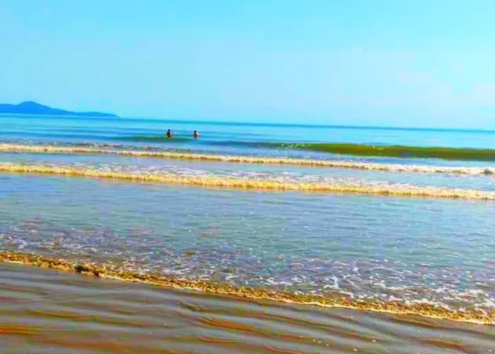 Quartos a 50 metros da praia