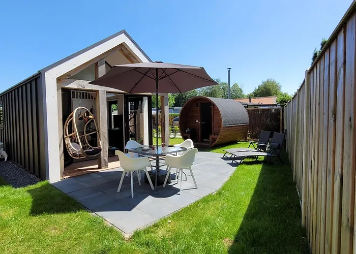 Tiny Zen House in Heinkenszand with private sauna, airco, outdoor swimming pool, WiFi&2 bedrooms
