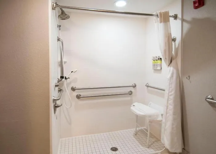 Queen Bed Hotel Suite 127