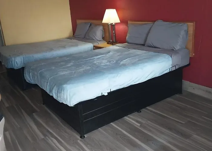 Gated 2 Double Beds Hotel Room 122