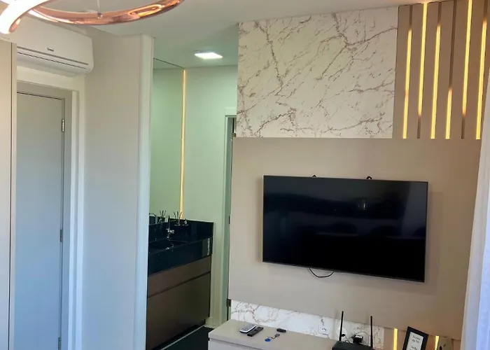 Ap completo a 900m da Oktoberfest com Piscina, Academia, Wi-Fi, Ar, Garagem e Tv no quarto