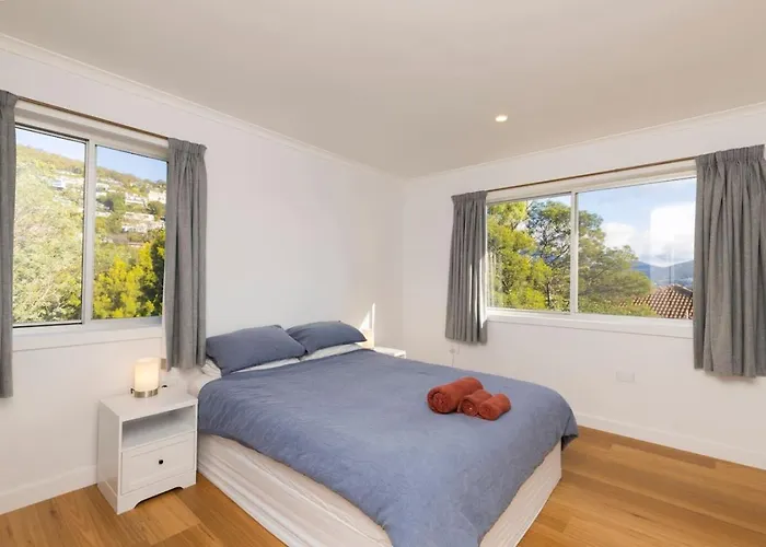 Renovated Two-Level Sandy Bay Apartment