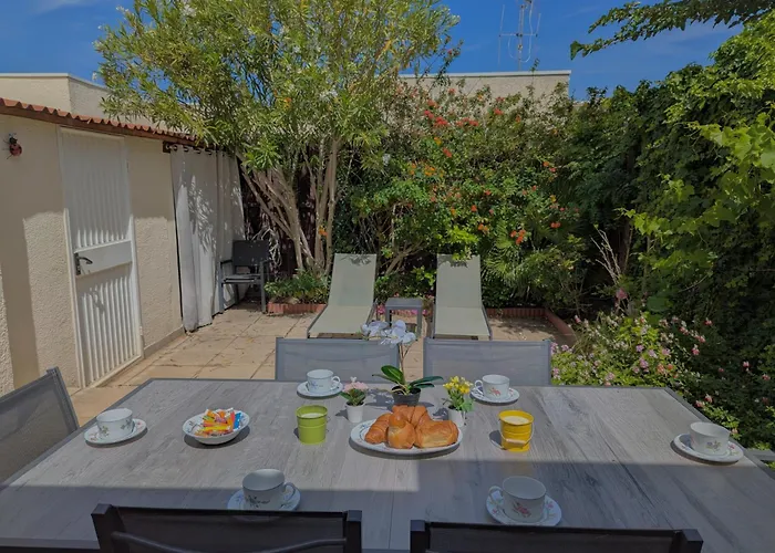 Sol-Y-Days Grau Village: Charming 3-Bedroom Holiday Home with Outdoor Space