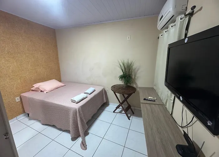 Quarto em AP compartilhado Ponta da areia