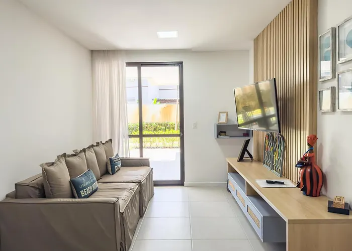 Casa Turquesa Pé na areia Piscina infinita Pet friendly Condomínio fechado