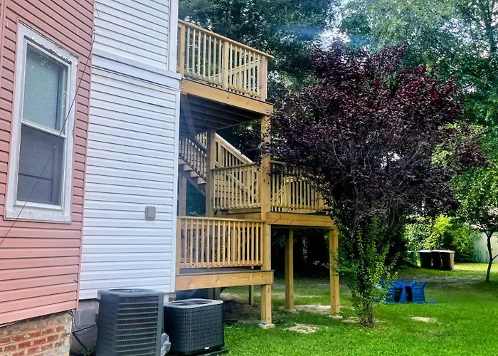 The Great Pink Lady With Huge Wrap Around Porch!
