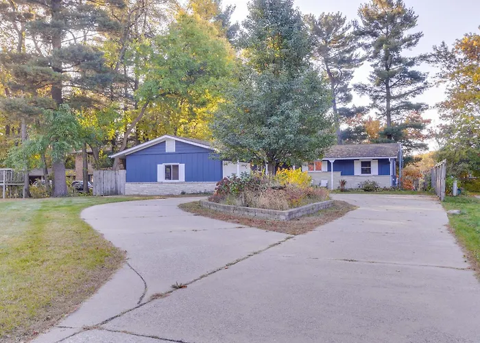 Antiquing & Fishing: Riverfront Waupaca Home!