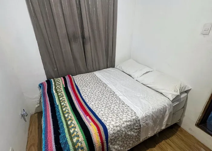 Quarto aconchegante no Jardim Faculdade
