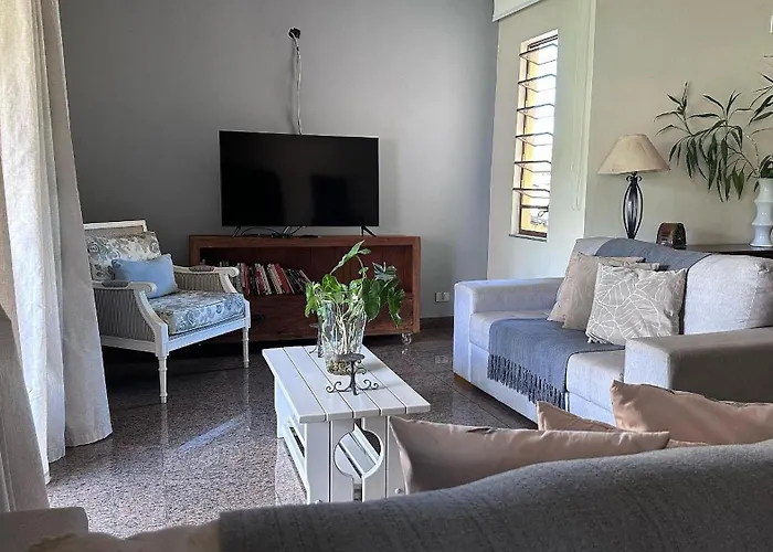Quarto Elegante - Casa com piscina no Centro