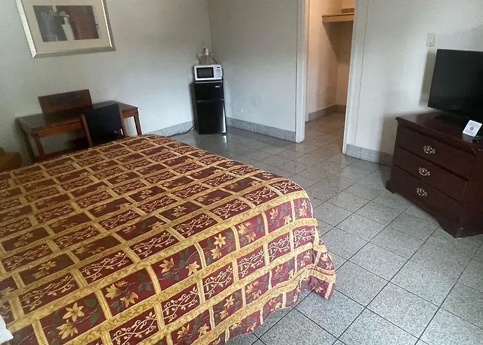 Budgetel Inn And Suites - Louisville