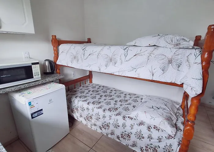 Kitnet S1 Torres: Beachfront Superhost Studio with AC and Parking