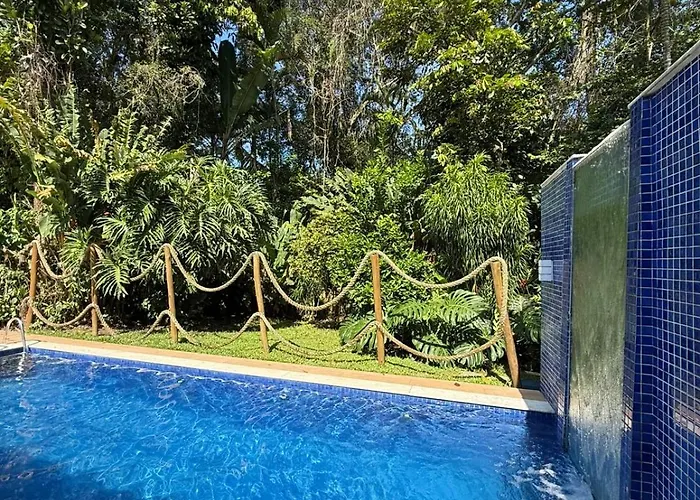 Casa Riviera de São Lourenço piscina climatizada, cascata, sauna, 4 suítes ar cond, área gourmet churrasqueira, 6 vagas de garagem, enxoval não fornecido, a casa conta com dependência de serviço com banheiro, Tv 75 e Tv 55 e Wi Fi
