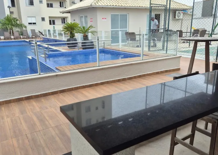 Easy Club 308 Apto 2 quartos Ar condicionado Wi-Fi Netflix Prime piscina Elevador Churrasqueira Sacada 200 m da praia Ideal para Famílias e Amigos Reserve agora